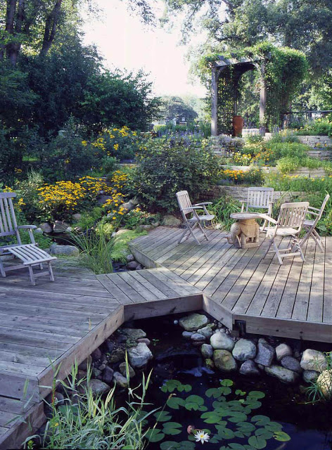 This unique deck dissects the pond, providing multiple viewing areas to enjoy the abundant aquatic plants and surrounding landscape.