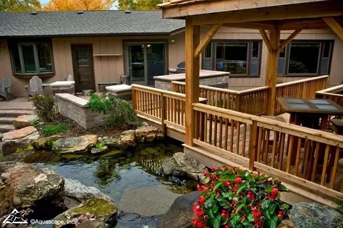 pond and deck near house