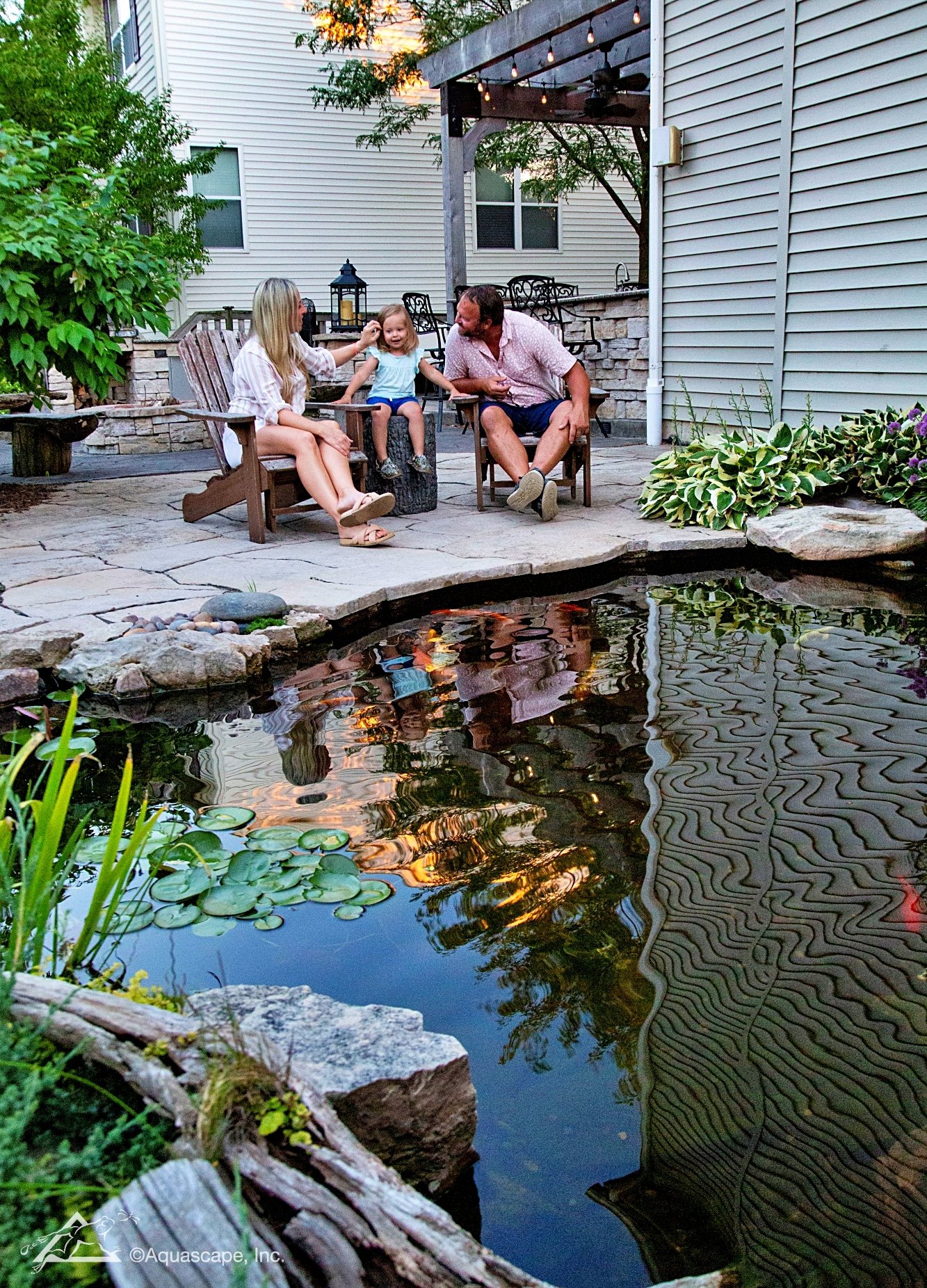 backyard koi pond with patio