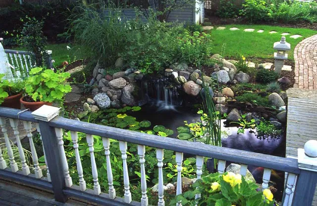 Isn't this the perfect spot for a morning cup o' coffee or a fruity glass of wine in the evening? The waterfall creates the added dimension of soothing sounds.