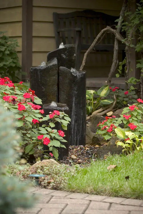 Fountain rocks add curb appeal at front entrance to home