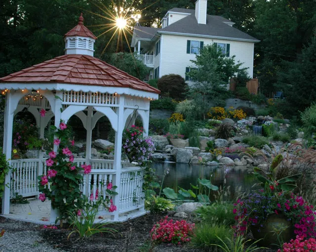 Fragrant flowers fill the air and provide pops of color around the waterscape