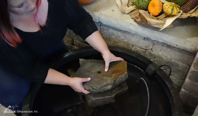 Setting up a Halloween pumpkin fountain