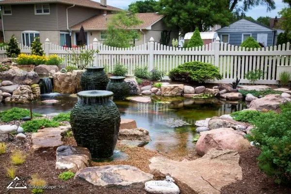 Medium pond with stacked slate urn fountains