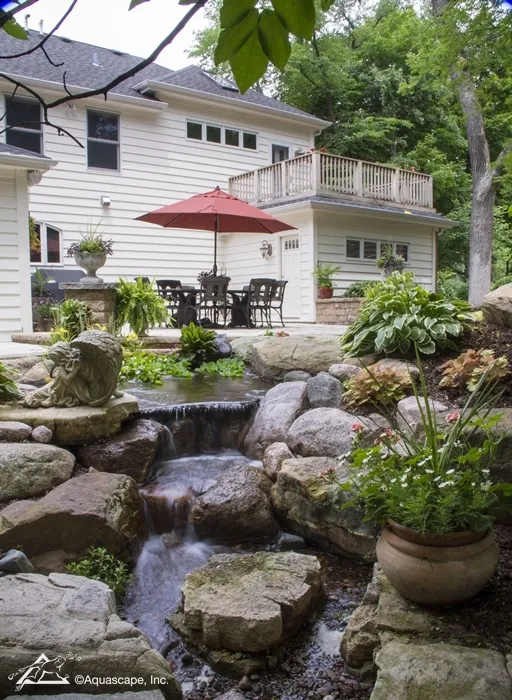 Dining Area with Backyard Waterfall