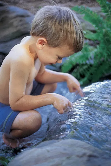 A waterfall without a pond (aka the Pondless Waterfall) creates a great spot for small children to get their feet wet.
