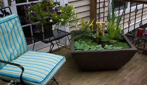 Fountin on patio with patio furniture