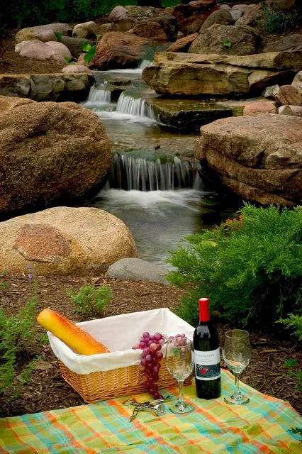 Even a casual picnic gets elevated to a divine experience when fine wine and fresh-baked bread are savored alongside the waterfalls.