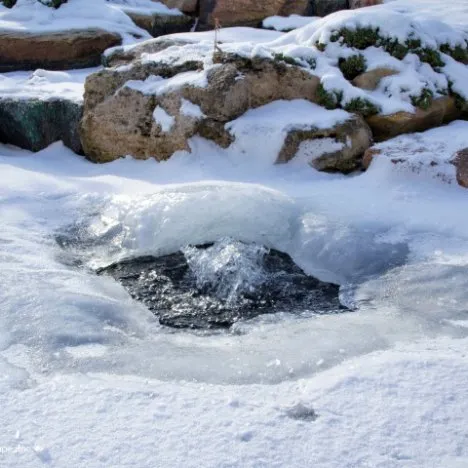 using pond aerator to keep hole in ice
