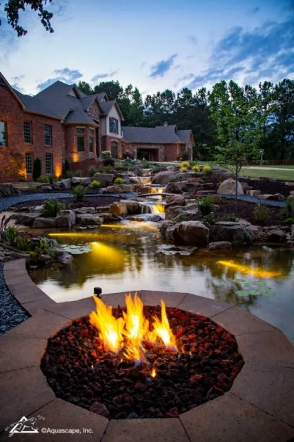 Fire Pit with Pond and Waterfall in Front Yard
