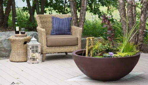 mini pond on patio with patio furniture