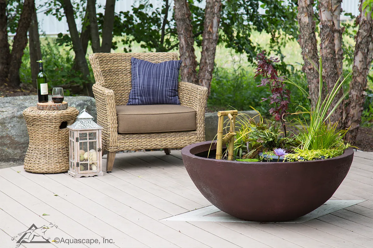 mini pond on patio with patio furniture
