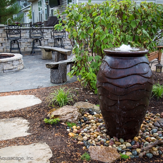 urn fountain with patio