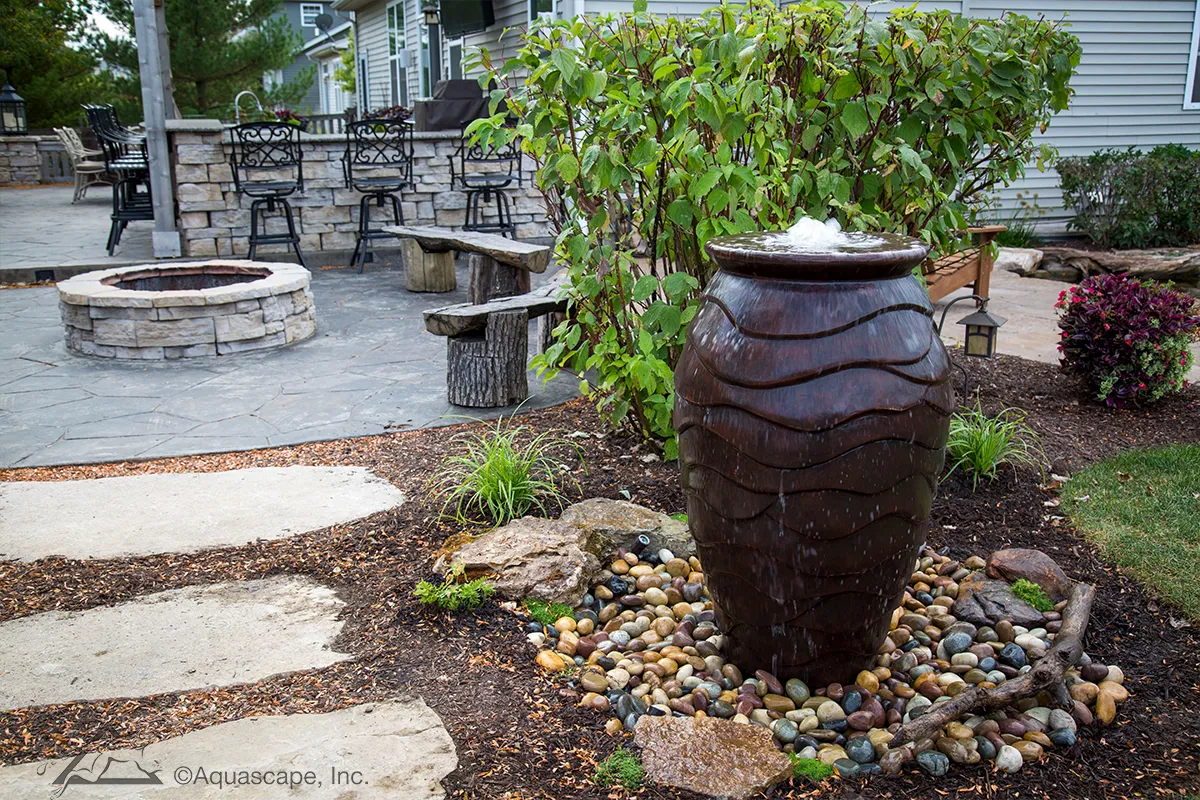 urn fountain with patio
