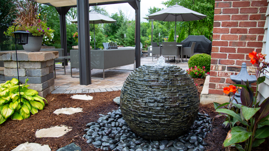 sphere fountain near patio
